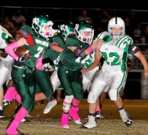 North Delta Junior High running back Jimmy Manues runs the ball for the Green Waves against Lee Academy Thursday night.  The Panolian Photo by Andy Young