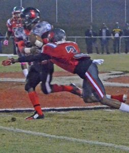 Defensive back Tyler Shorter tackles an Independence runner to stop the run. The Cougars were defeated 44-26. The Panolian Photo by Ike House 