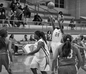 North Panola Jr. High’s Ania Taylor (back) shoots from top of the circle against Batesville Jr. High last Monday while teammate Kelmisha Jackson gets into position. The Panolian photo by Ike House